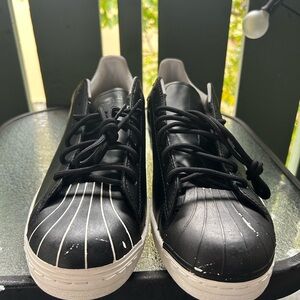 Puma Men's Black Sneakers with White Stripes